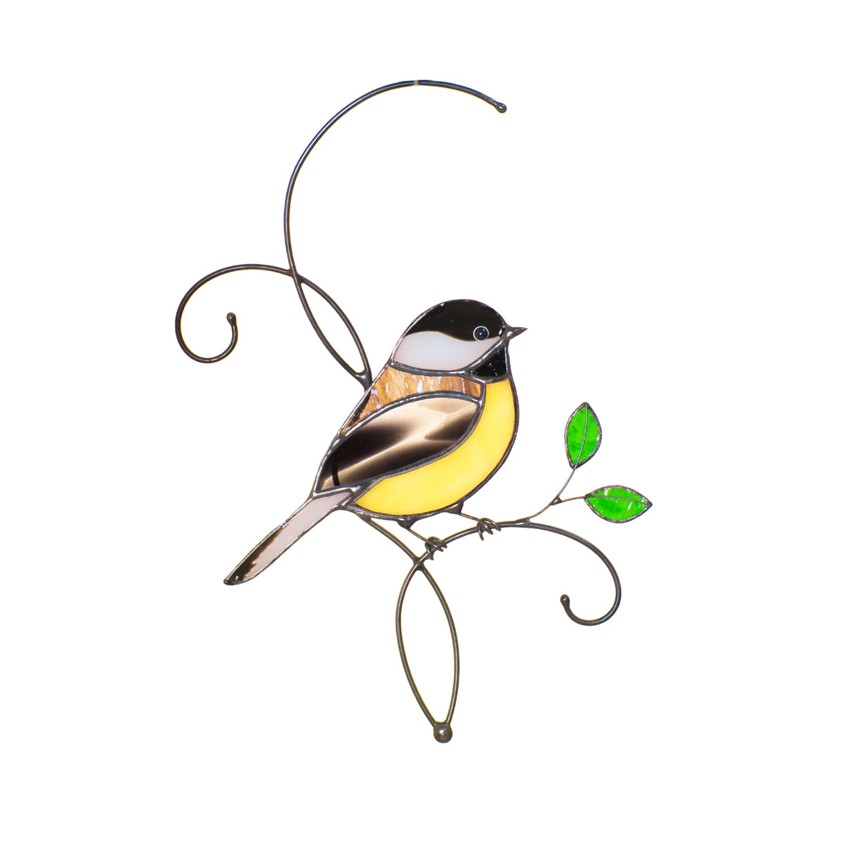 Handmade stained glass chickadee suncatcher on a white background, a black-capped chickadee with a yellow belly perched on a wire branch with two green glass leaves - bird window decor
