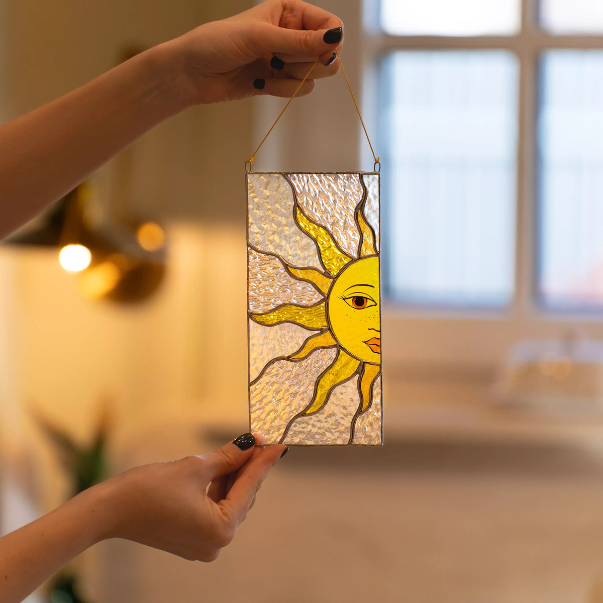 Interior stained glass suncatcher, sun face window decor, cozy home glass art, celestial handmade hanging ornament.