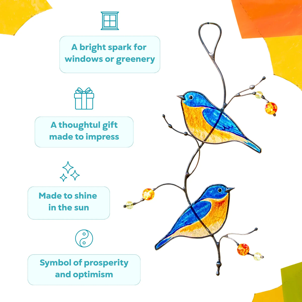 Stained glass birds sitting on a branch as a meaningful gift