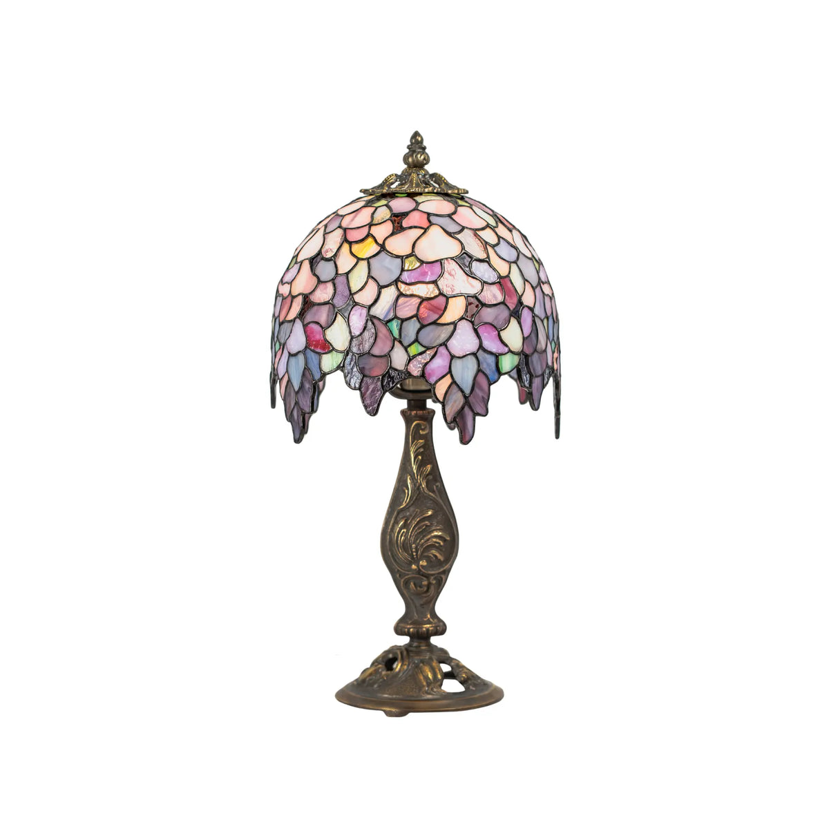 Stained glass Tiffany table lamp with pastel Wisteria design and antique bronze stand on white background.