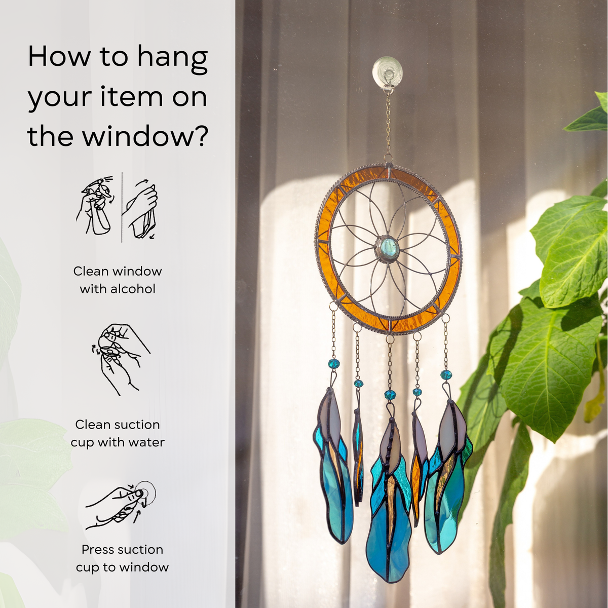 Dreamcatcher hanging on a window inside, with instruction: clean window and suction cup, press a cup to the surface.