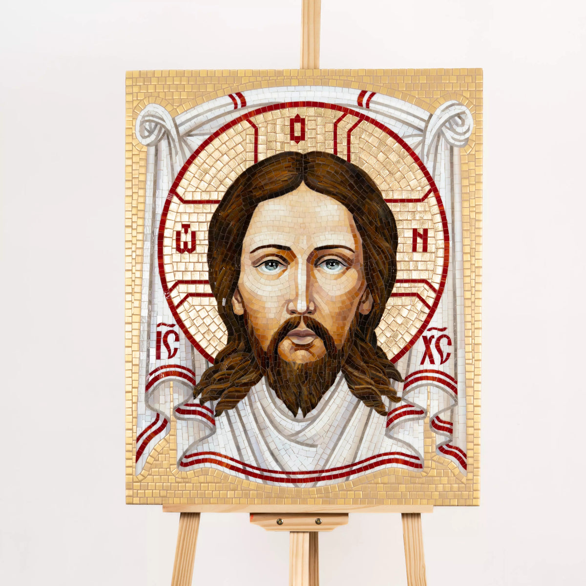 Staiend glass mosaic Image of Edessa on an easel with a white background