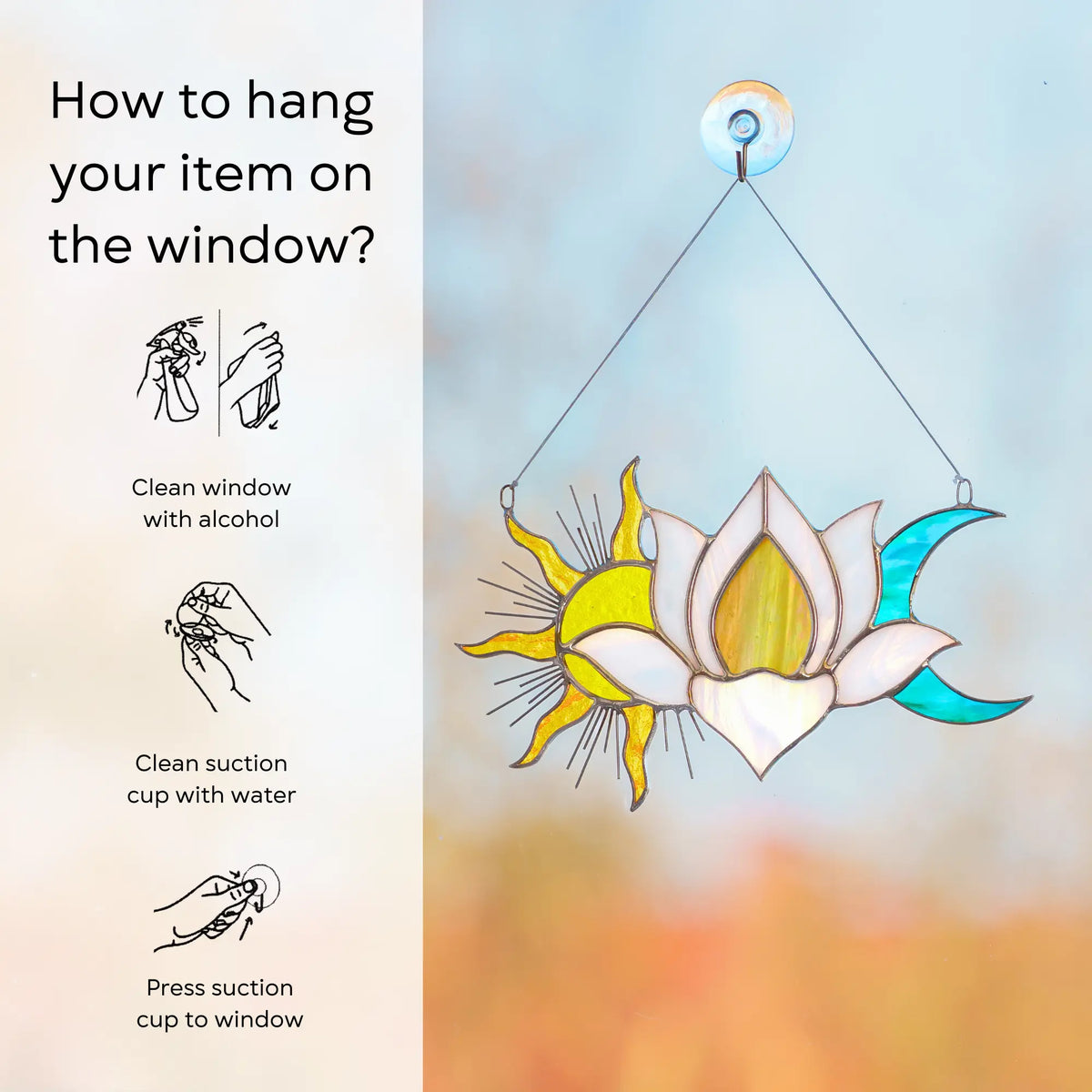 Instructions on how to hang a stained glass suncatcher with a sun, moon, and lotus design on a window: use lint-free cloth, polish joints with car wax or furniture polish, avoid harsh chemicals, and windy places.