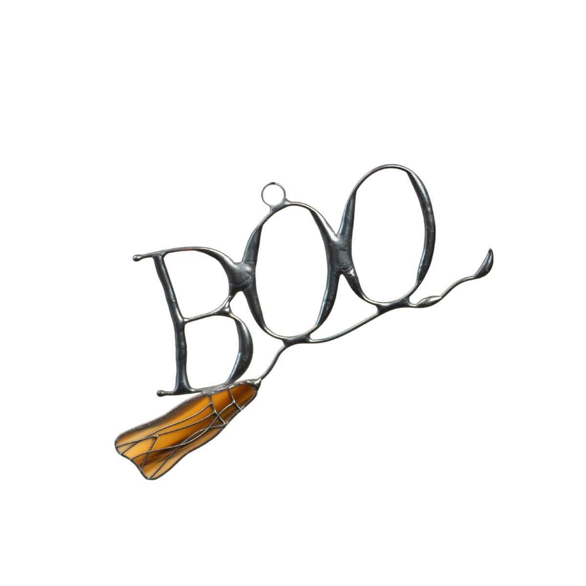 A stained glass suncatcher spelling “BOO” with a stylized orange witch’s broom at the bottom