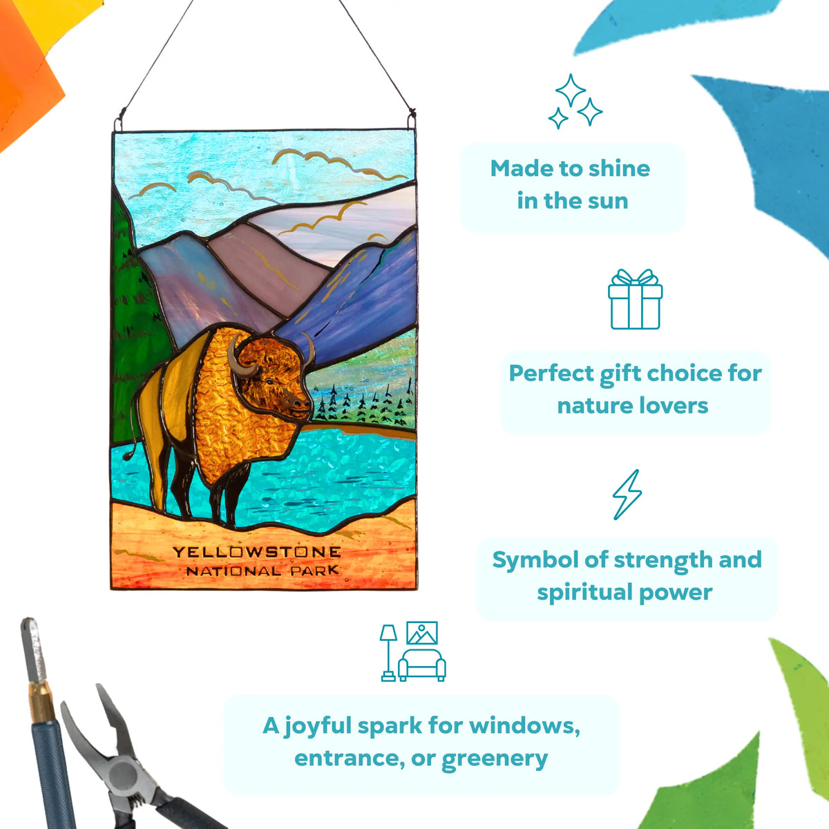 Stained glass panel of a bison in Yellowstone National Park with decorative text and tools on a light blue background.