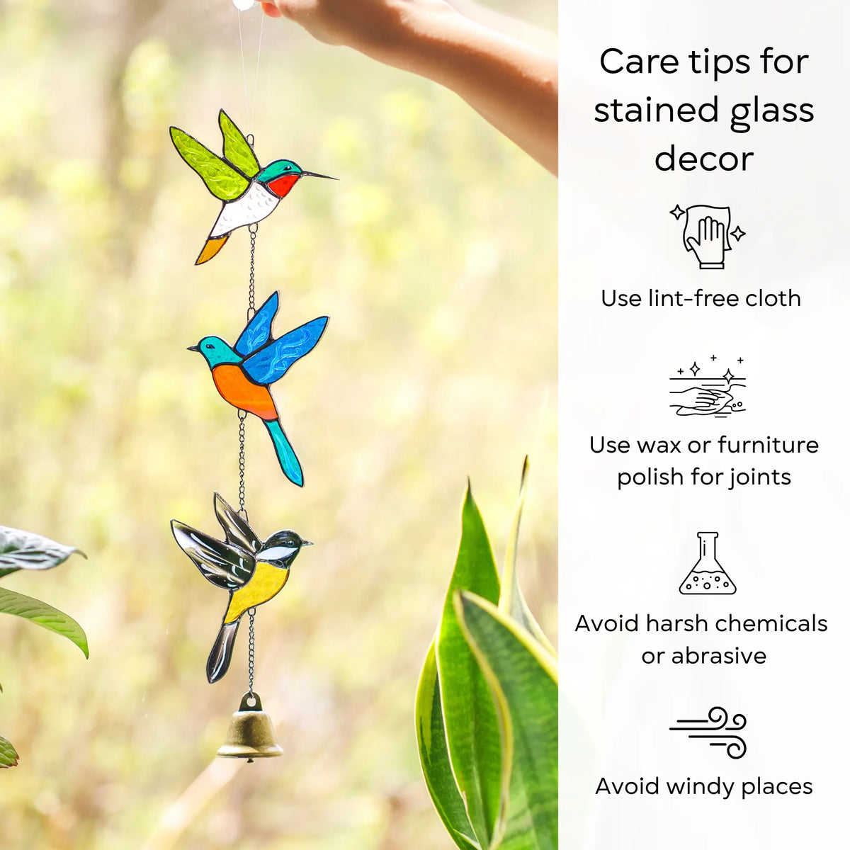 Colorful stained glass birds hanging with care tips on a natural background: use lint-free cloth, polish joints with car wax or furniture polish, avoid harsh chemicals, and windy places.