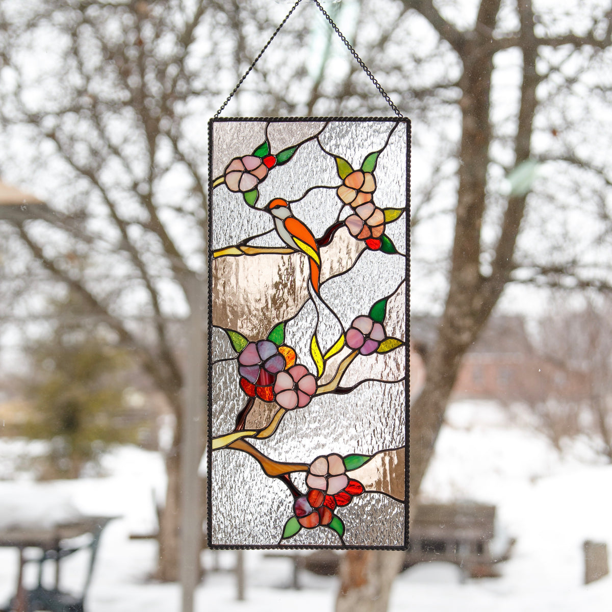 Stained glass cherry blossom and birds sitting on the branch panel