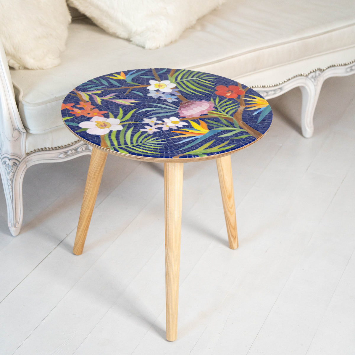 Stained glass round mosaic table depicting tropical plants