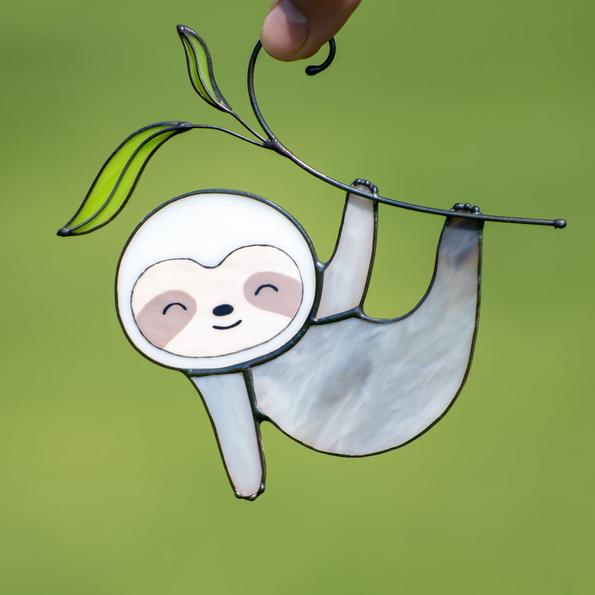 Zoomed stained glass sloth suncatcher