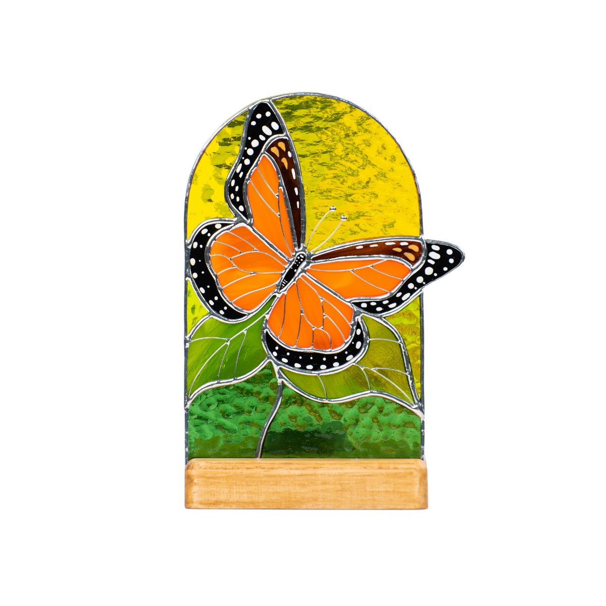 Panel de vitral: Mariposa monarca a la luz de las velas