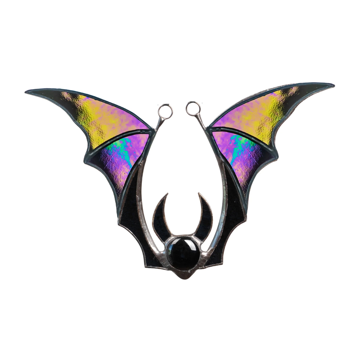 Handmade Halloween stained glass suncatcher shaped as a bat with iridescent wings shifting purple, pink and gold, a black glass body and a round black cabochon at the centre