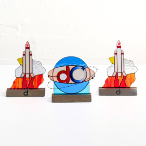 A set of space-themed stained glass panels 