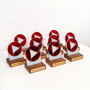 Ten awards featuring a red and white stained glass design