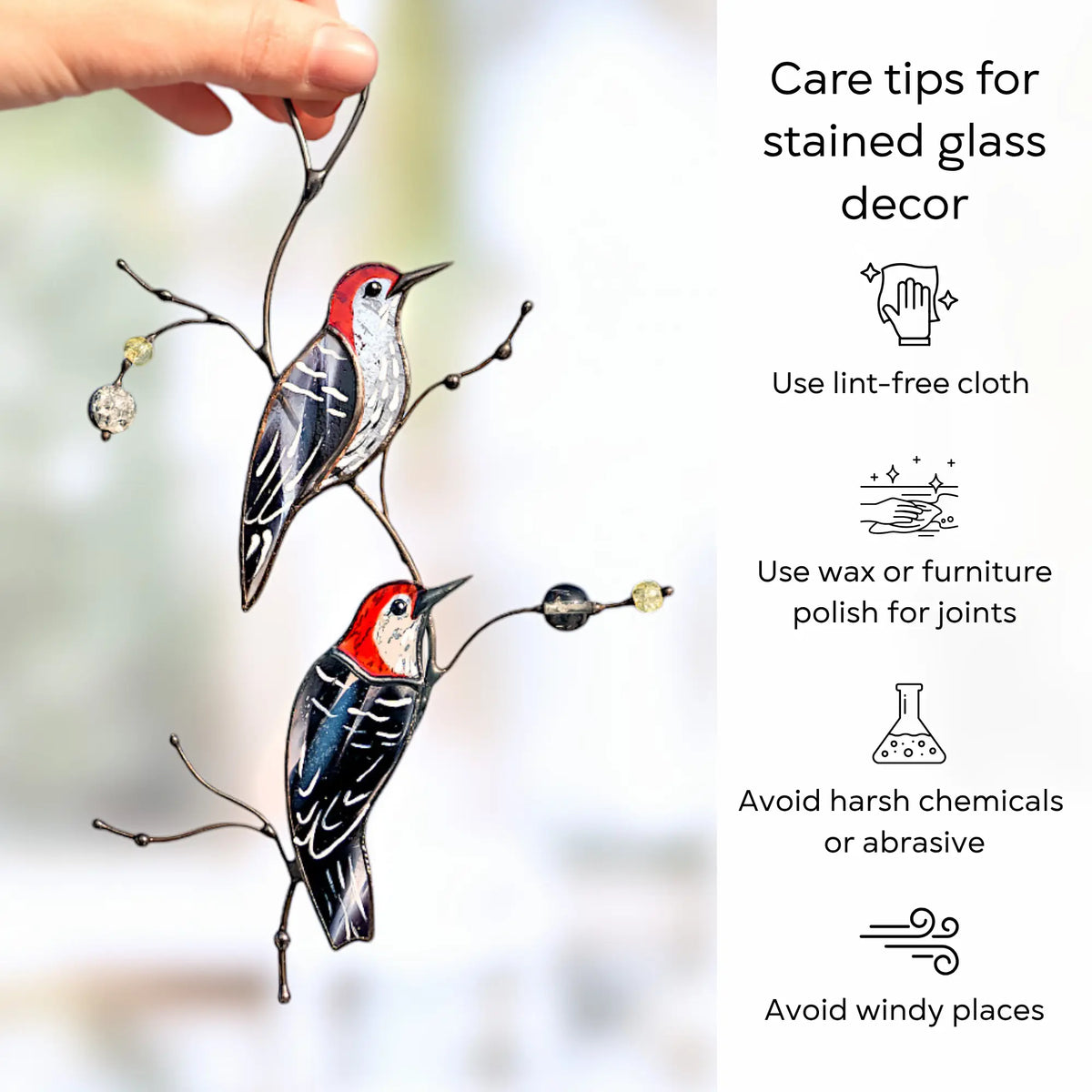 An infographic featuring woodpecker pair in suncatcher with tips: using a lint-free cloth, wax/furniture polish for joints, avoiding harsh chemicals, and avoiding windy places.