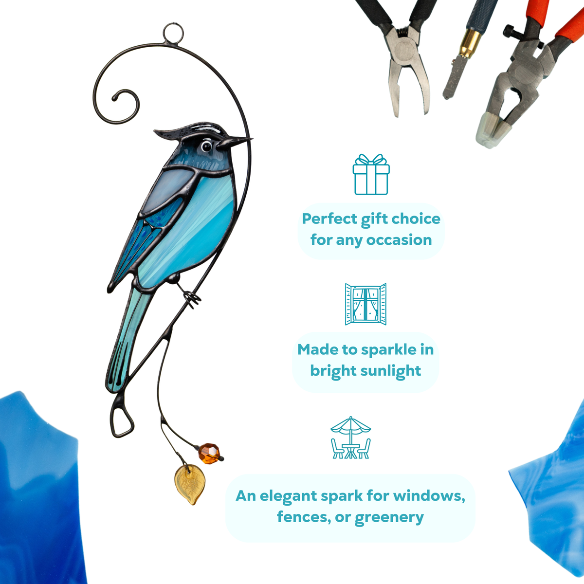 Bright blue stained glass Steller’s jay on a branch with yellow glass leaf and amber bead, gift and decor tips