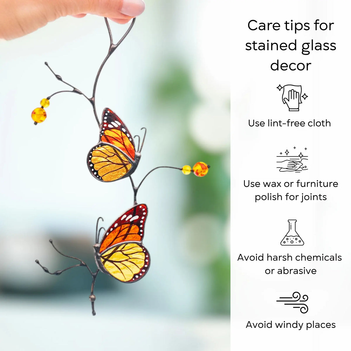 Monarch butterfly stained glass decor with care tips on a blurred background: use lint-free cloth, polish joints with car wax or furniture polish, avoid harsh chemicals, and windy places.