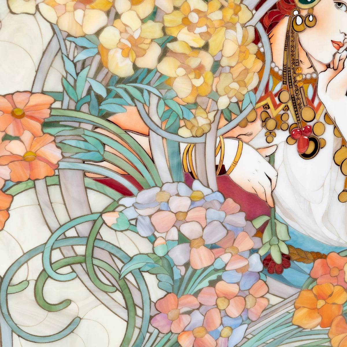 Woman’s hand holding a flower among flowing leaves and pastel florals in the stained glass artwork