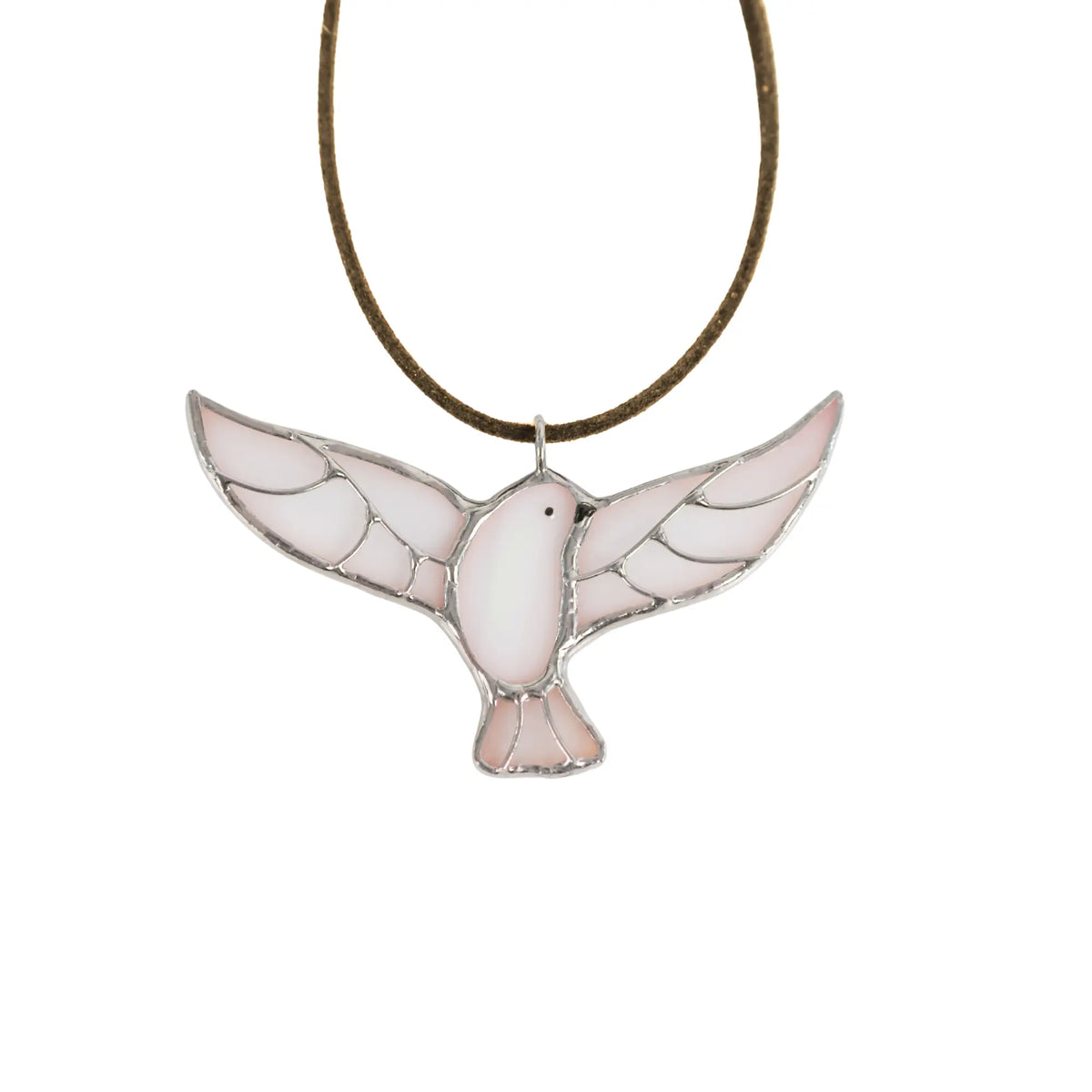 A close-up of a person wearing a bird-shaped necklace