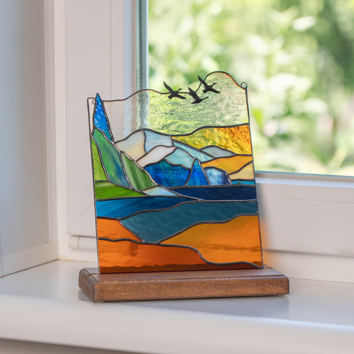 stained glass national park panel on the wood base