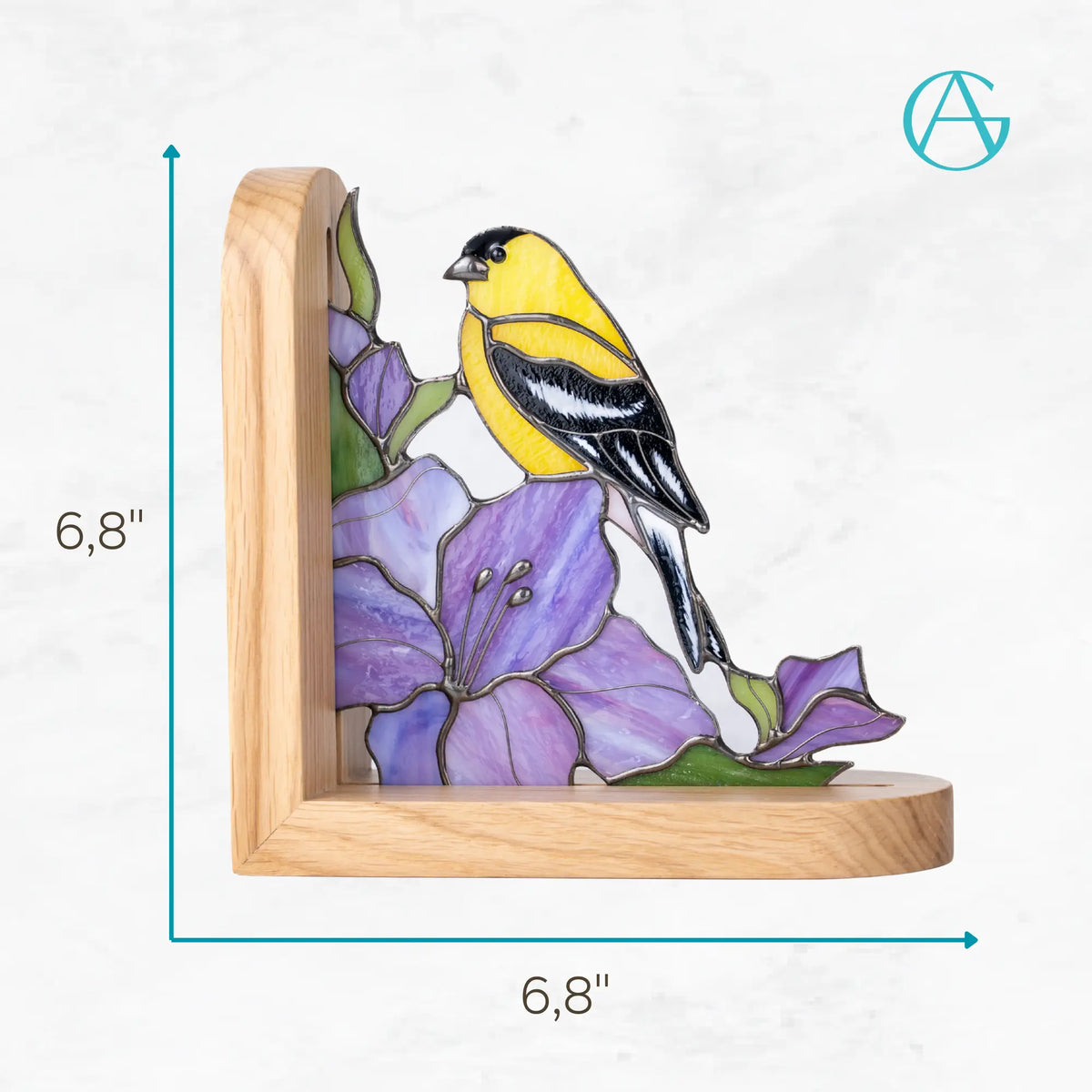 Stained glass bookend with goldfinch sitting on a purple flowers with dimensions: 6,8 x 6,8 inches