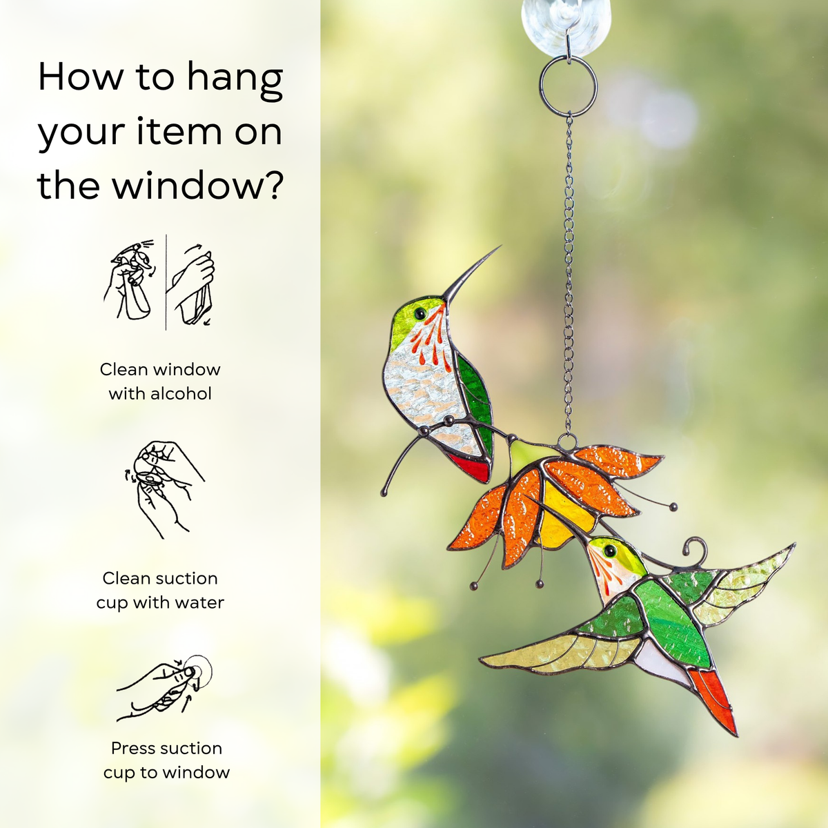 Hummingbird suncatcher with orange flower hanging on window via suction cup, next to step-by-step hanging guide: clean window and suction cup, press a cup to the surface.