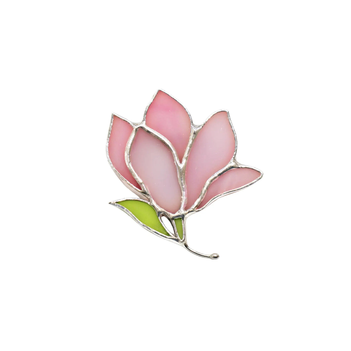 Stained glass pink magnolia brooch on a white background