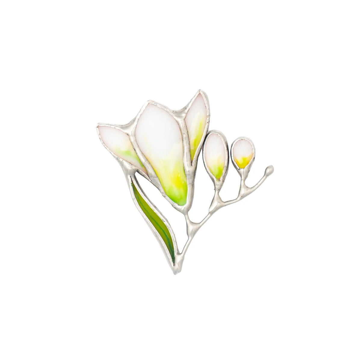 Stained glass brooch featuring white and green freesia design on a white background