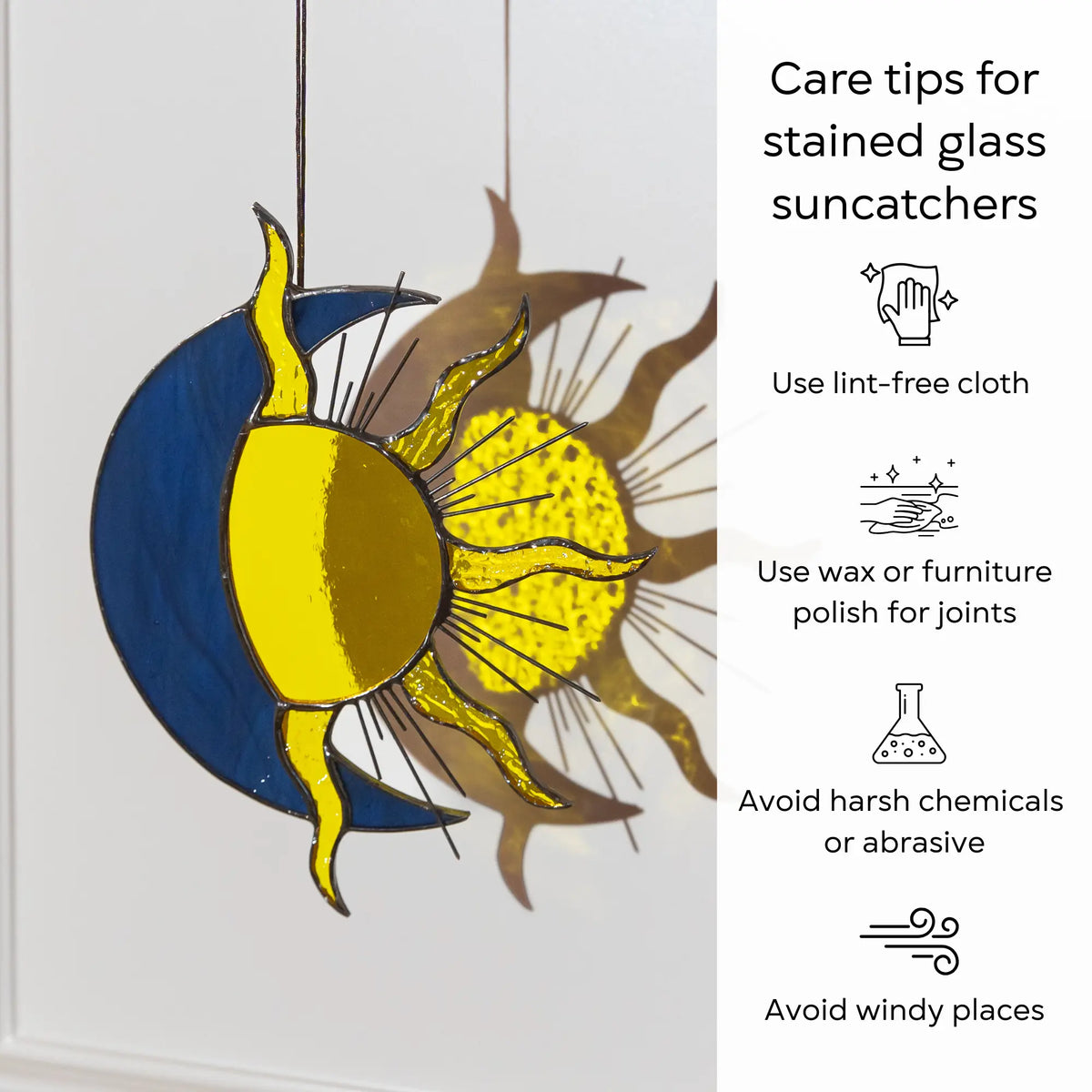 Stained glass sun and moon suncatcher with care tips on a white background: use lint-free cloth, polish joints with car wax or furniture polish, avoid harsh chemicals, and windy places.