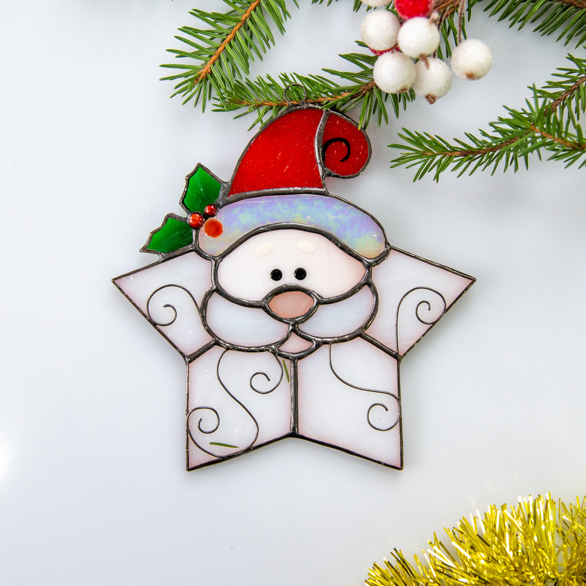 Snowflake Santa suncatcher of stained glass for winter window decor 