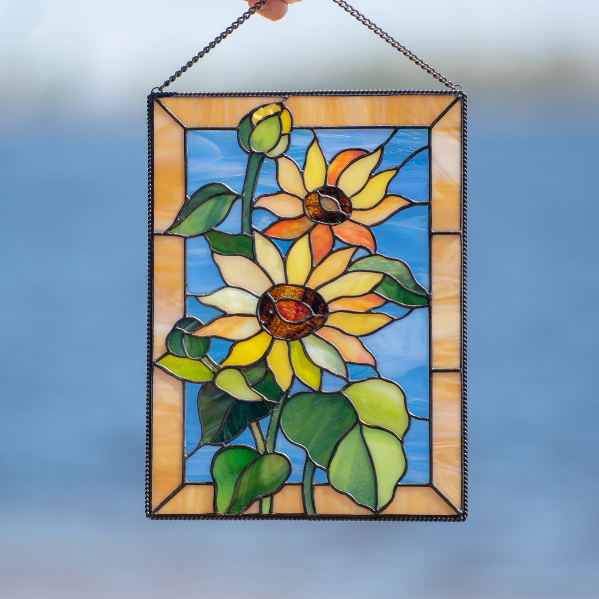 Zoomed stained glass sunflower window panel