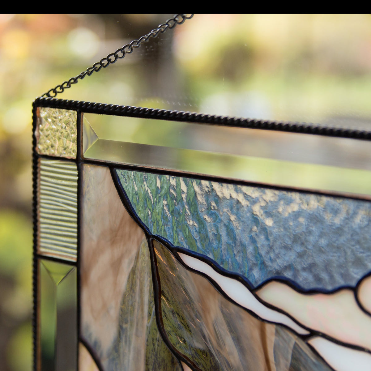 Zoomed stained glass panel of Banff national park
