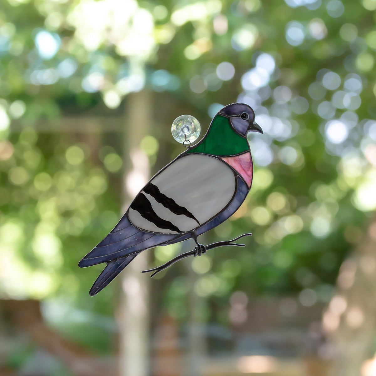 Stained glass pigeon window hanging